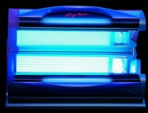A blue light is shown in the dark.